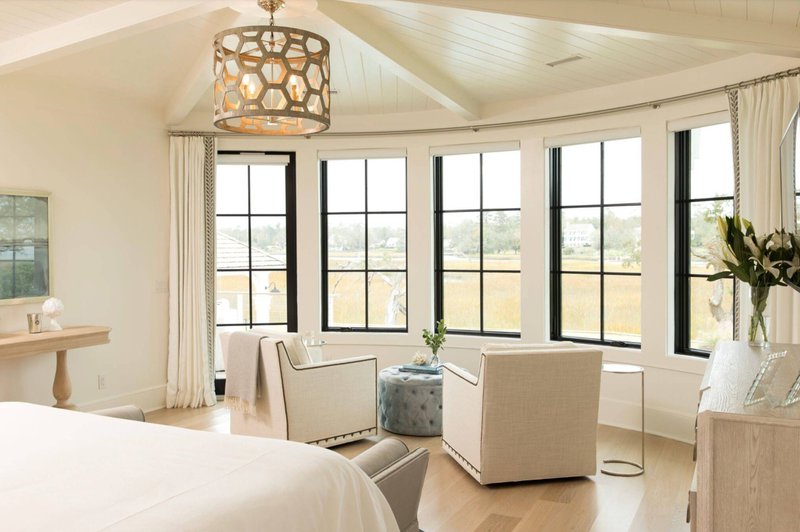 Interior Design Tips: High ceilings enhance natural light and help neutral palettes feel expansive.