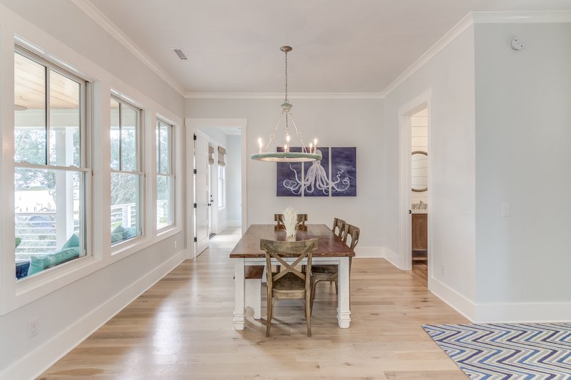 Positioning large windows at the back increases home privacy.