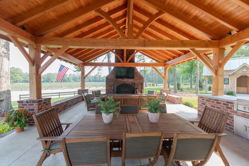 Outdoor dining area with wood furniture